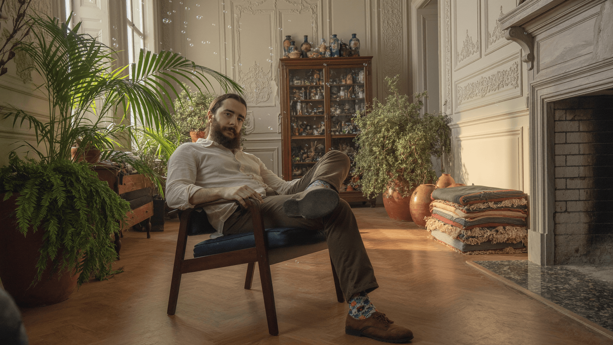 Youssef in a sunlit sitting room